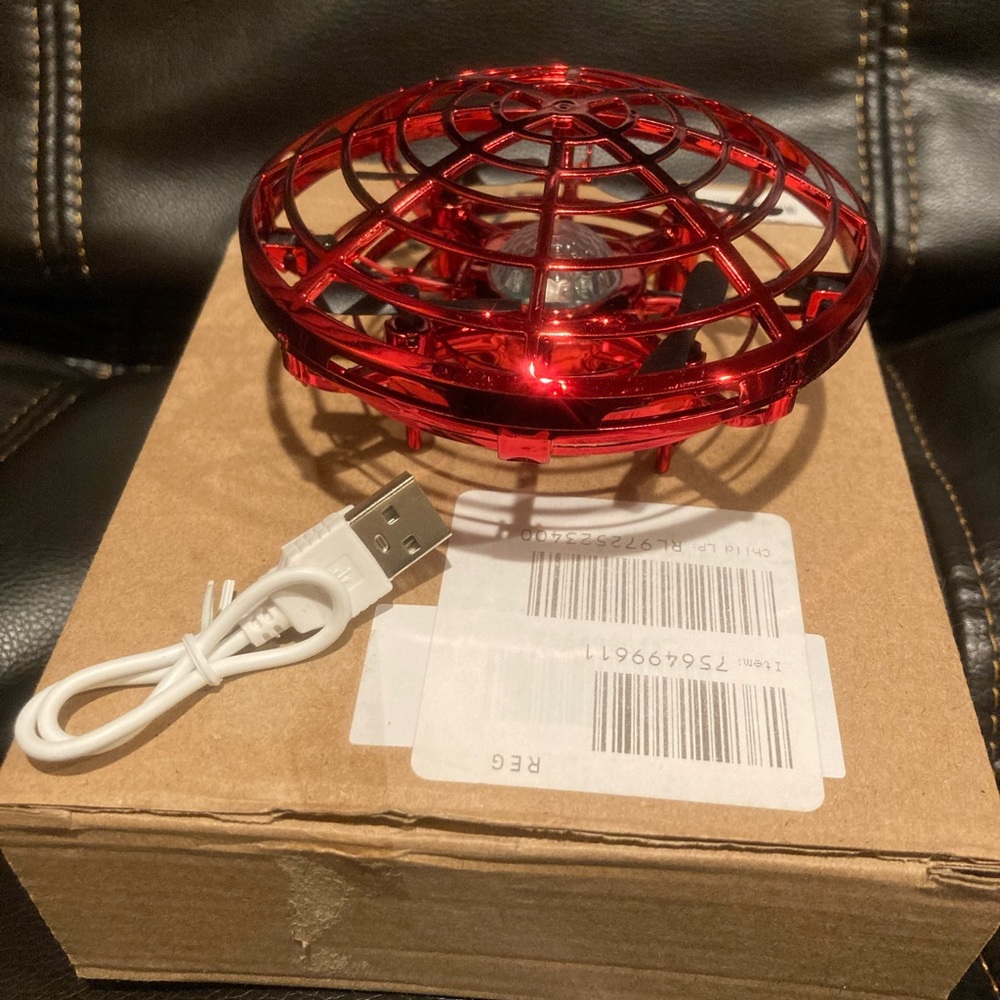 UFO interactive aircraft induction quadcopter, NIB red.